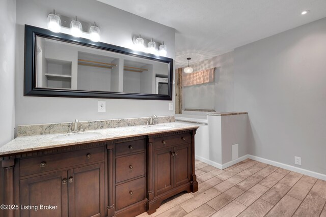 1468 Lakeshore Pkwy, Brandenburg, KY 40108 - bathroom featuring double vanity and wood finish floors