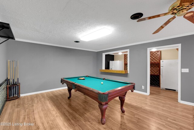 1468 Lakeshore Pkwy, Brandenburg, KY 40108 - recreation room featuring wood finished floors, ceiling fan, ornamental molding, billiards, and a textured ceiling