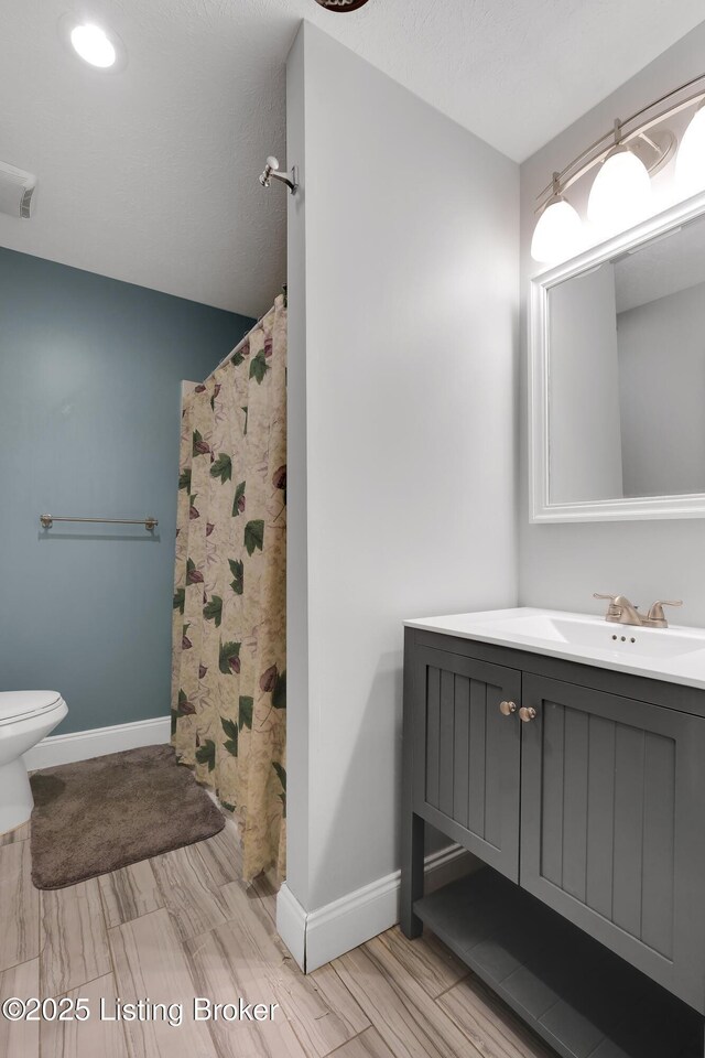 1468 Lakeshore Pkwy, Brandenburg, KY 40108 - full bath with vanity, wood tiled floors, and curtained shower