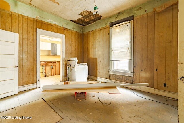 interior space featuring wooden walls