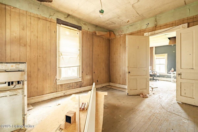empty room with wood walls