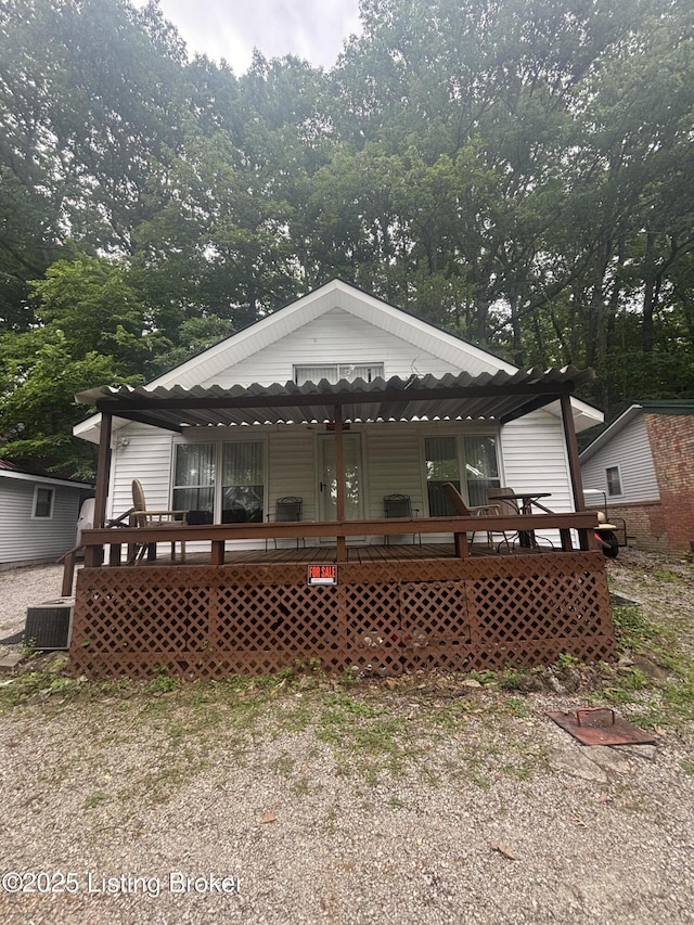 1009 Wilderness Rd, Mammoth Cave, KY 42259 - rear view of house with a porch