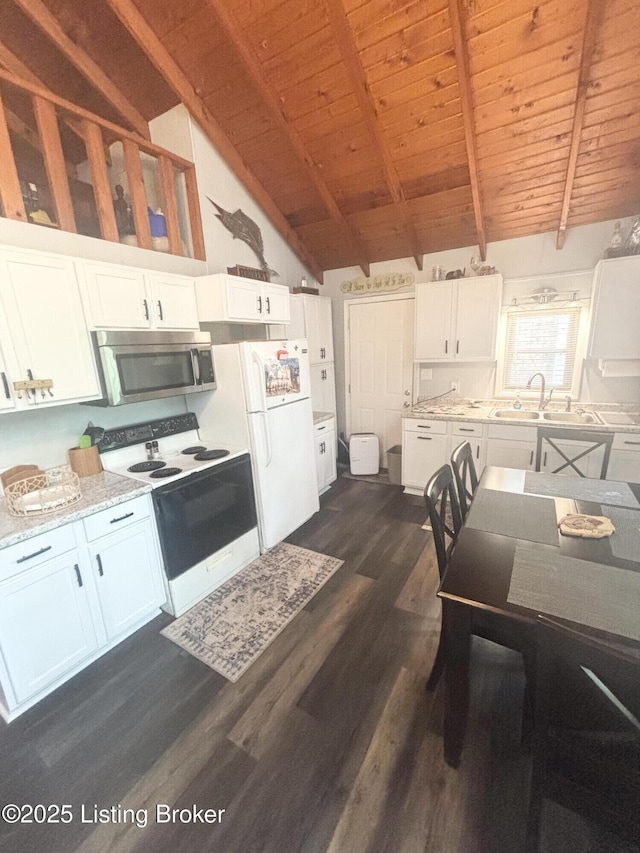 1009 Wilderness Rd, Mammoth Cave, KY 42259 - kitchen with white appliances, wooden ceiling, white cabinetry, and dark wood-style floors