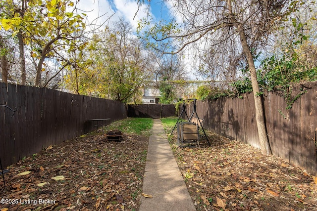 view of yard with a fenced backyard