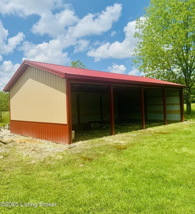 1109 Holly Ave, Louisville, KY 40118 - view of pole building with a lawn