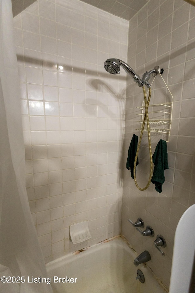 full bathroom with shower / bath combination