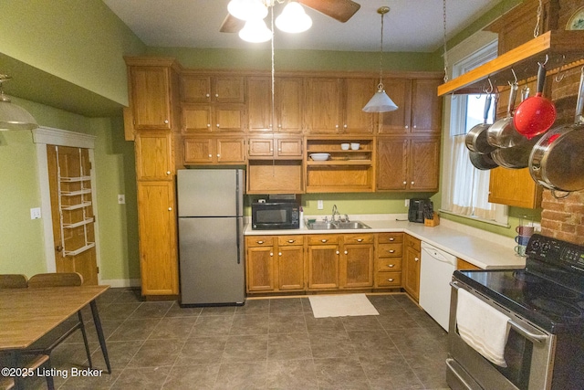 kitchen with brown cabinets, stainless steel appliances, a sink, open shelves, and hanging light fixtures