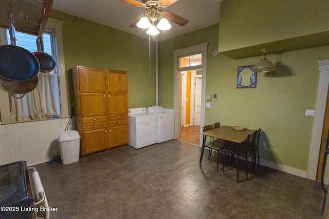 dining space featuring baseboards, separate washer and dryer, and ceiling fan