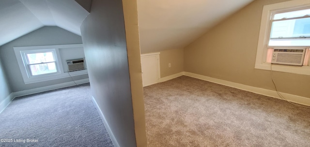 502 Montana Ave, Louisville, KY 40208 - bonus room featuring cooling unit, lofted ceiling, baseboards, an AC wall unit, and carpet