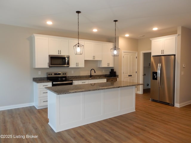 239 Bullitt Creek Dr Unit 12, Shepherdsville, KY 40165 - kitchen with a sink, white cabinetry, wood finished floors, appliances with stainless steel finishes, and recessed lighting
