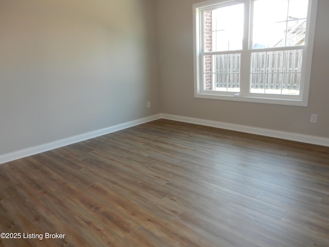 239 Bullitt Creek Dr Unit 12, Shepherdsville, KY 40165 - unfurnished room with baseboards and wood finished floors