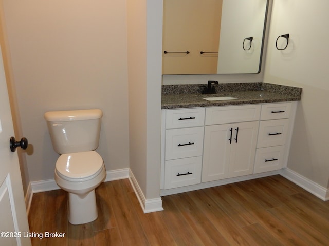 239 Bullitt Creek Dr Unit 12, Shepherdsville, KY 40165 - half bath featuring baseboards, toilet, vanity, and wood finished floors