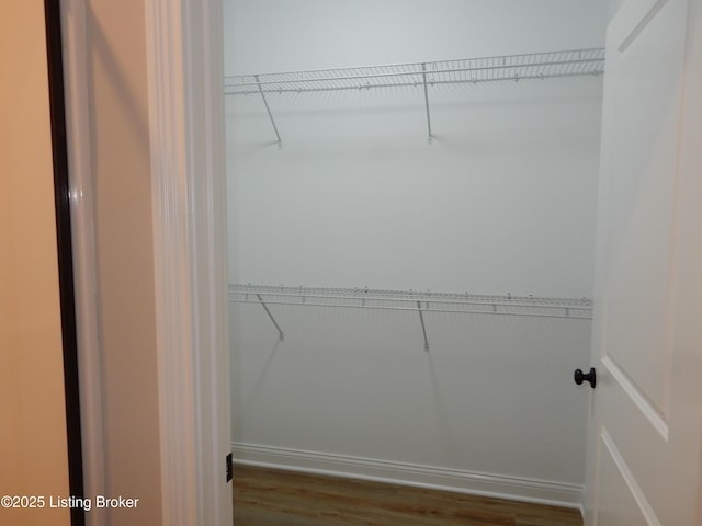 239 Bullitt Creek Dr Unit 12, Shepherdsville, KY 40165 - walk in closet featuring wood finished floors