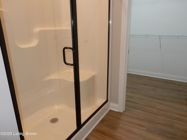 239 Bullitt Creek Dr Unit 12, Shepherdsville, KY 40165 - full bath featuring a shower stall, baseboards, wood finished floors, and a spacious closet