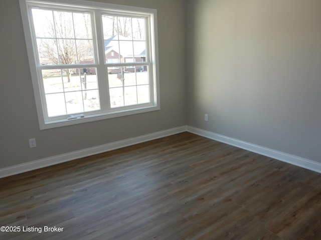 239 Bullitt Creek Dr Unit 12, Shepherdsville, KY 40165 - empty room with baseboards and dark wood finished floors