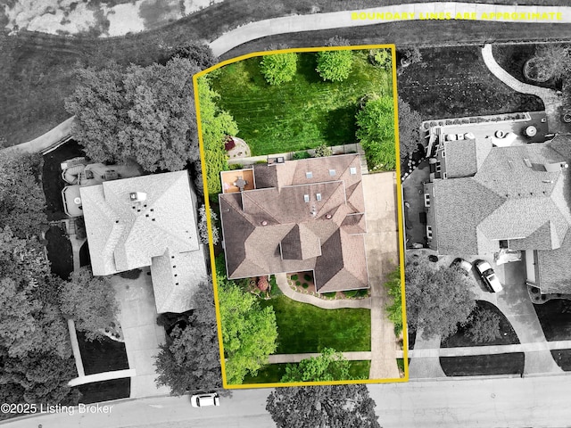 aerial view of property and surrounding area with property parcel outlined