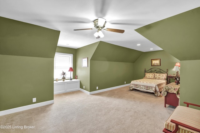 carpeted bedroom with vaulted ceiling, baseboards, recessed lighting, and a ceiling fan