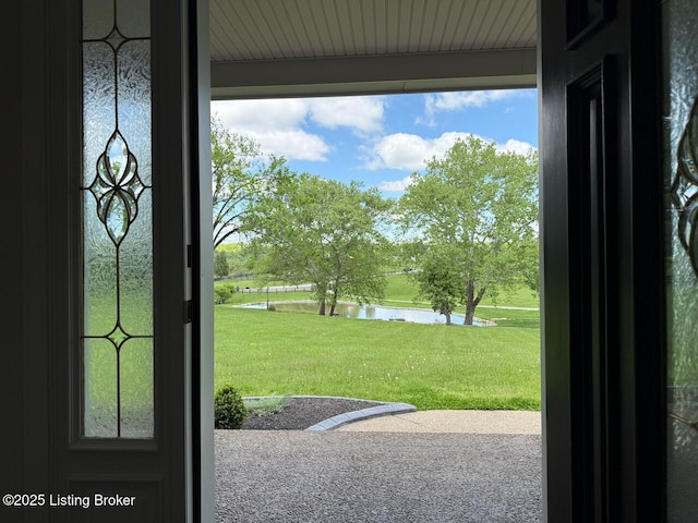 entryway featuring a water view