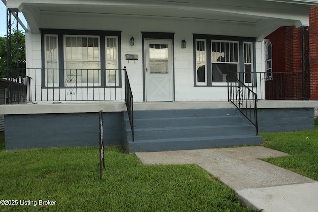 4832 N Main, Eminence, KY 40019 - view of front of property featuring covered porch and a front lawn