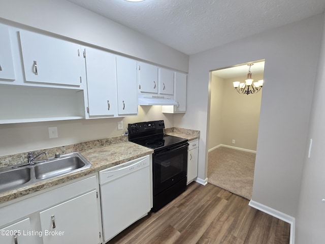 kitchen with a sink, white cabinetry, black range with electric cooktop, dishwasher, and under cabinet range hood