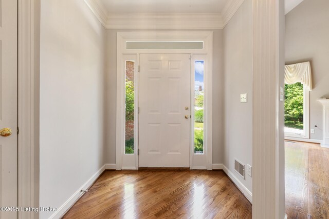 7808 Grenoble Ln, Prospect, KY 40059 - foyer entrance featuring light wood-style flooring, baseboards, and crown molding