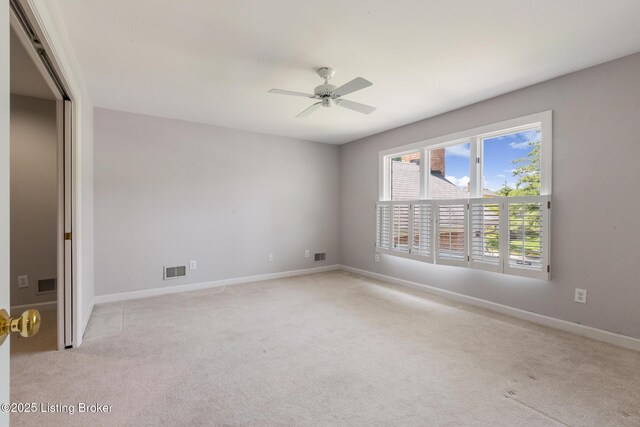 7808 Grenoble Ln, Prospect, KY 40059 - spare room featuring light carpet, a ceiling fan, and baseboards