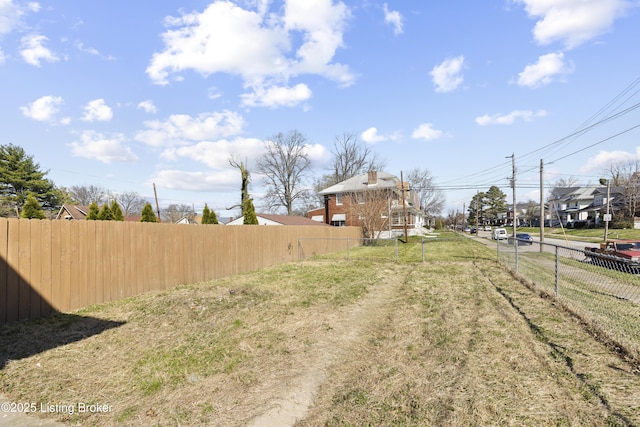 view of yard featuring fence