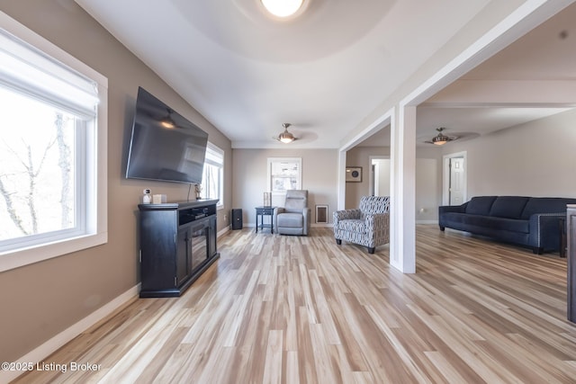432 Four Seasons Rd, Falls Of Rough, KY 40119 - living area with a ceiling fan, baseboards, light wood-type flooring, and a fireplace