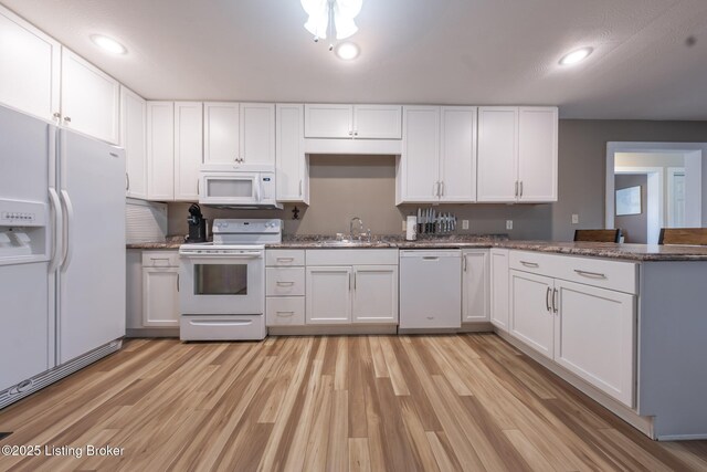 432 Four Seasons Rd, Falls Of Rough, KY 40119 - kitchen with white appliances, light wood finished floors, white cabinetry, a sink, and recessed lighting