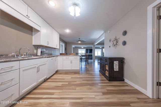 432 Four Seasons Rd, Falls Of Rough, KY 40119 - kitchen with dishwasher, a ceiling fan, light wood-style floors, and white cabinets