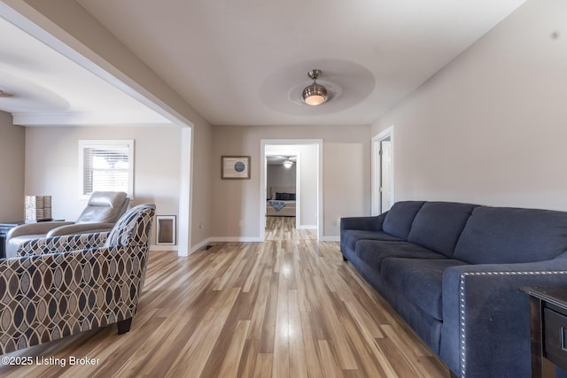432 Four Seasons Rd, Falls Of Rough, KY 40119 - living area featuring a ceiling fan, light wood finished floors, and baseboards