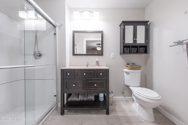 432 Four Seasons Rd, Falls Of Rough, KY 40119 - bathroom featuring a shower stall, toilet, baseboards, and vanity