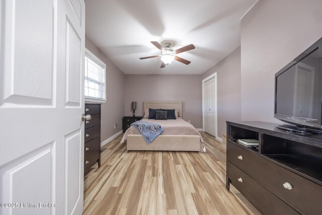 432 Four Seasons Rd, Falls Of Rough, KY 40119 - bedroom with light wood-style flooring, baseboards, a closet, and a ceiling fan