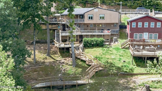 432 Four Seasons Rd, Falls Of Rough, KY 40119 - back of house with stairs, a deck, and a lawn