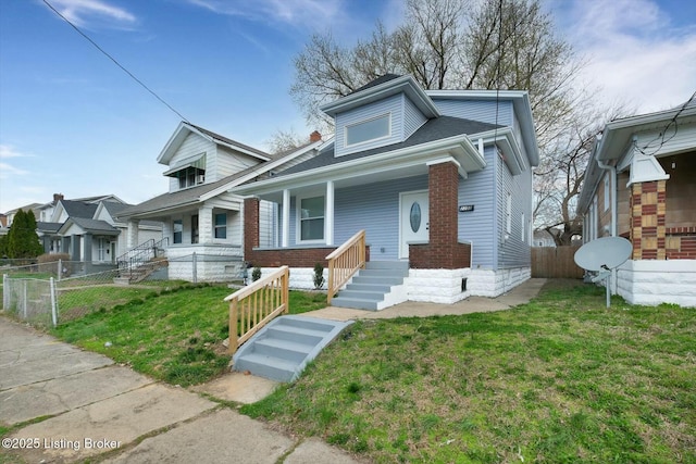 2203 Date St, Louisville, KY 40210 - bungalow-style home with a gate, fence, a front lawn, and a porch