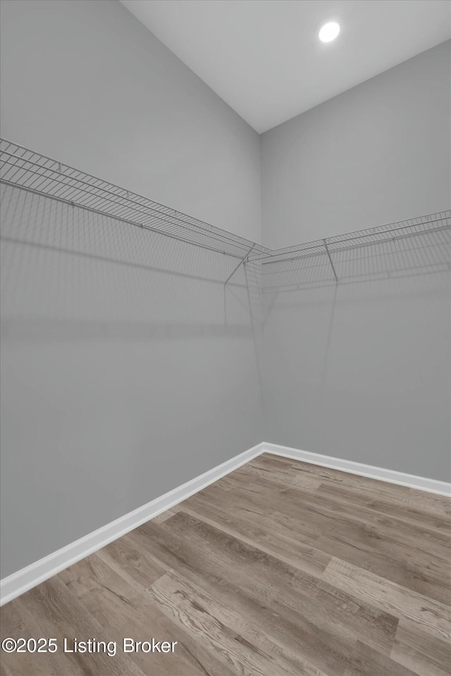 2203 Date St, Louisville, KY 40210 - walk in closet with wood finished floors