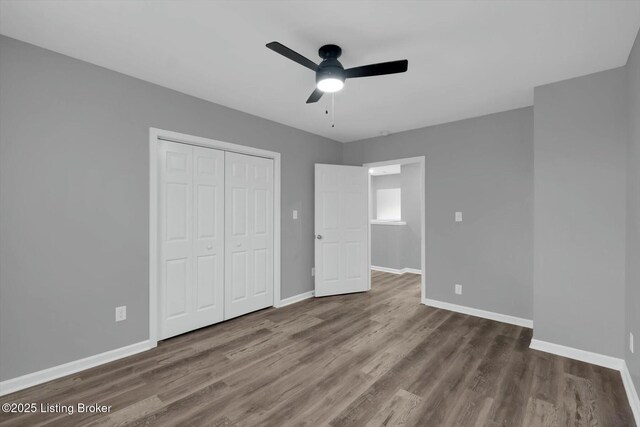 2203 Date St, Louisville, KY 40210 - unfurnished bedroom featuring baseboards and wood finished floors