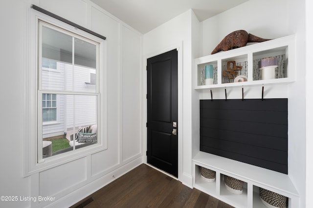 mudroom with dark wood-type flooring