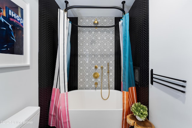 bathroom with toilet and shower / bath combination with curtain