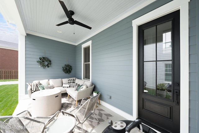 view of patio with ceiling fan and an outdoor living space