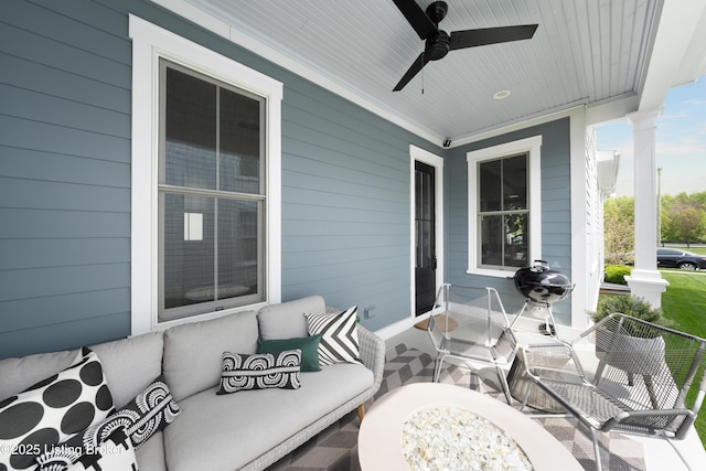view of patio / terrace featuring outdoor lounge area, a ceiling fan, and covered porch
