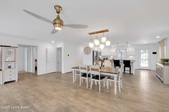 100 Bellemeade St, Brandenburg, KY 40108 - dining area featuring light wood-style floors, a ceiling fan, and recessed lighting