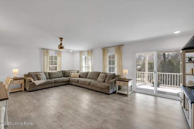 100 Bellemeade St, Brandenburg, KY 40108 - living area featuring plenty of natural light, light wood finished floors, and ceiling fan