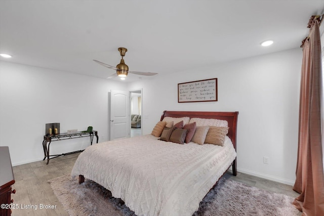100 Bellemeade St, Brandenburg, KY 40108 - bedroom with recessed lighting, baseboards, a ceiling fan, and wood finished floors