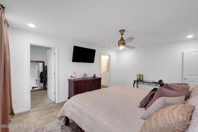 100 Bellemeade St, Brandenburg, KY 40108 - bedroom with baseboards, recessed lighting, ensuite bathroom, a ceiling fan, and light wood-style floors