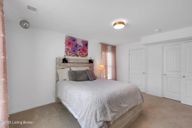 100 Bellemeade St, Brandenburg, KY 40108 - bedroom featuring light colored carpet, baseboards, and visible vents