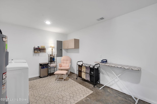 100 Bellemeade St, Brandenburg, KY 40108 - living area with baseboards, electric panel, visible vents, independent washer and dryer, and concrete flooring