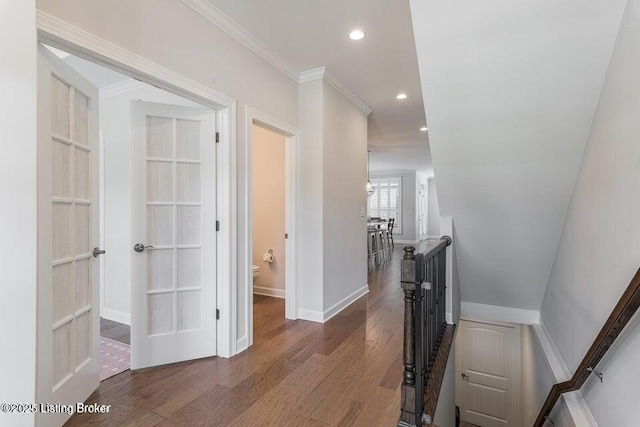 11125 Radleigh Ln, Louisville, KY 40291 - corridor featuring an upstairs landing, wood finished floors, recessed lighting, baseboards, and crown molding
