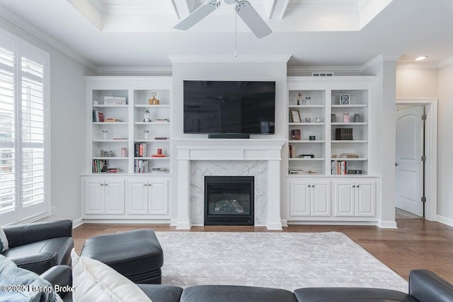 11125 Radleigh Ln, Louisville, KY 40291 - living room with ceiling fan, healthy amount of natural light, ornamental molding, wood finished floors, and a premium fireplace