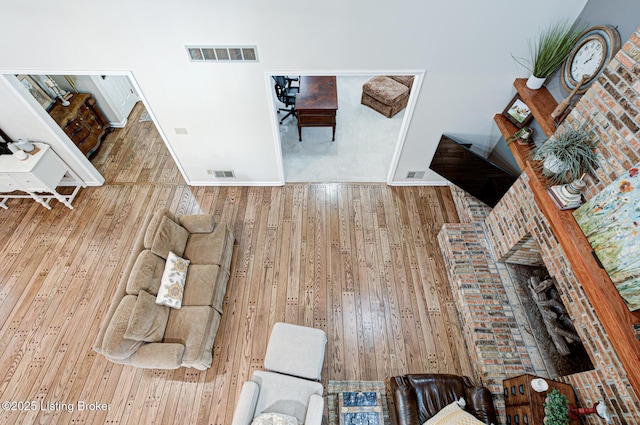 1014 Old Mill Stream Ln, Shepherdsville, KY 40165 - living area featuring hardwood / wood-style floors and baseboards